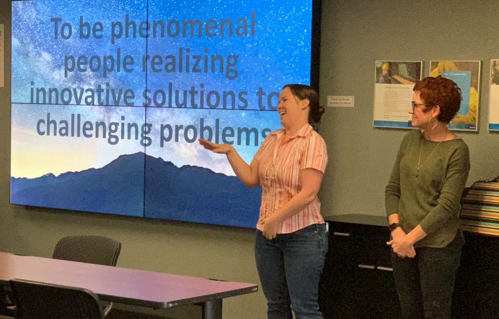 Erin & Stephanie announce the new team mascot, Perry, recognizing employee's outstanding work